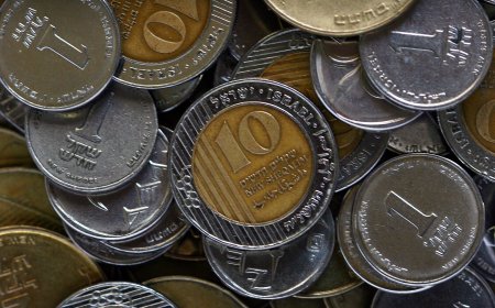 أزمة تراكم عملة الشيكل في المصارف الفلسطينية