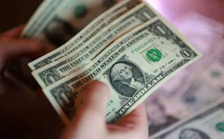 الدولار يتراجع من أعلى مستوياته في 18 شهراً مع هبوط النفط وترقب بيانات التضخم